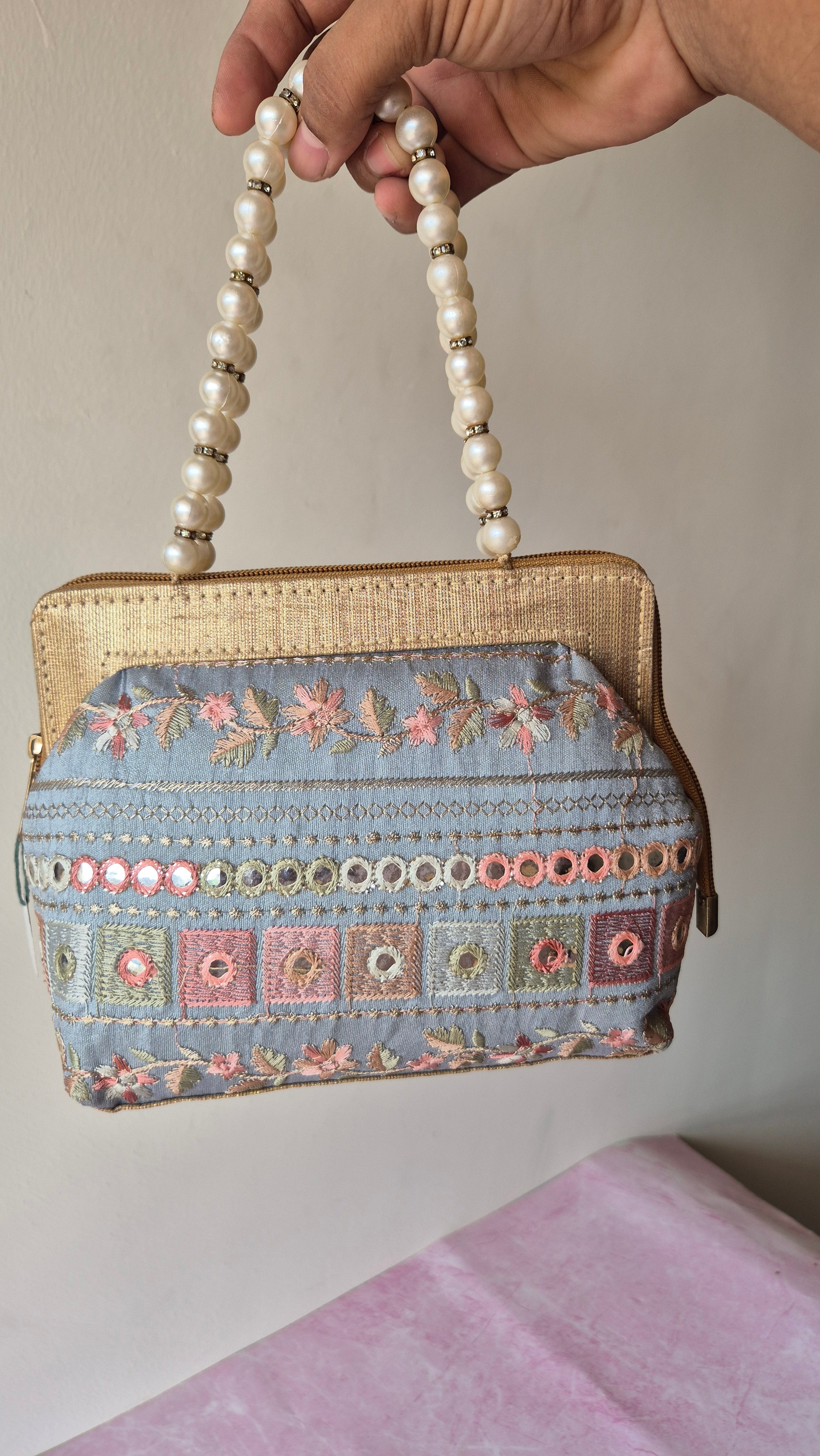 Embroidered potli handbag