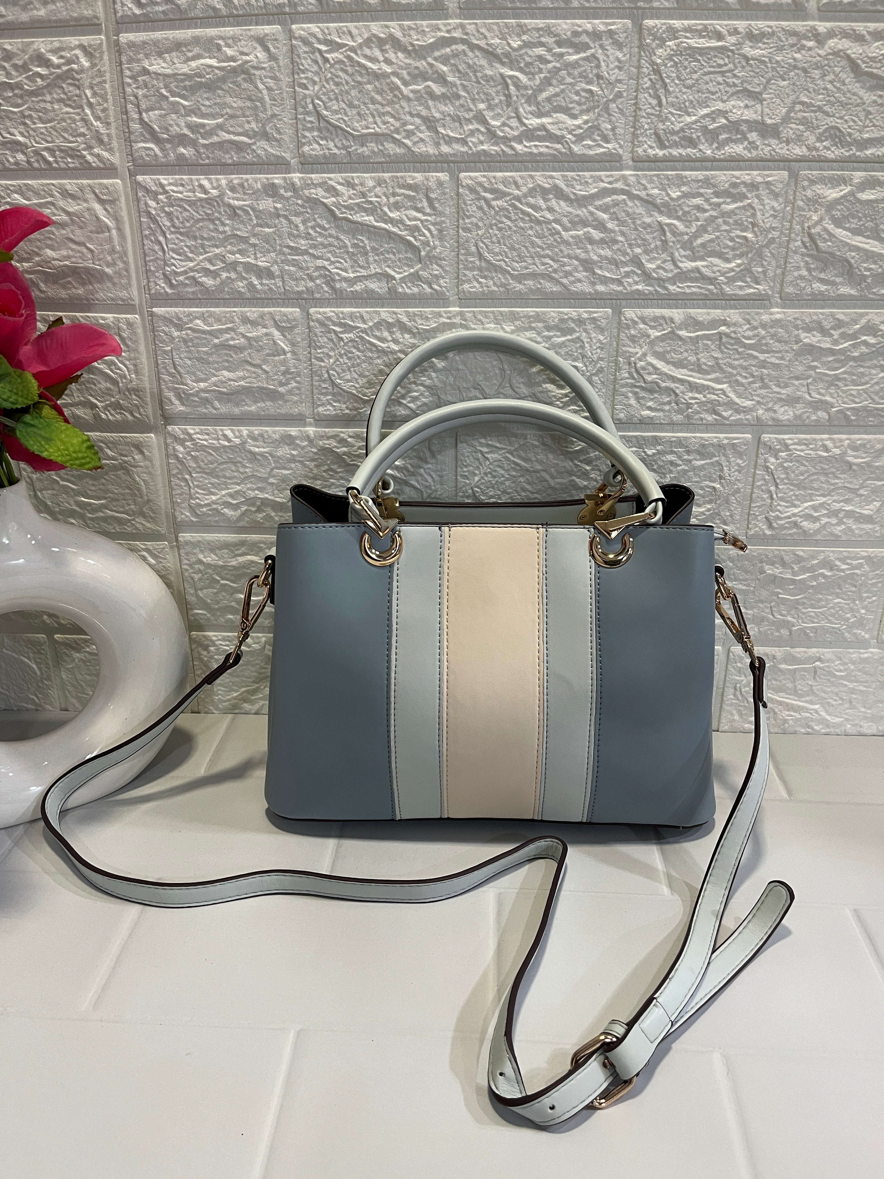 Dual - Tone Structured Handbag (Available in pink and blue variants)